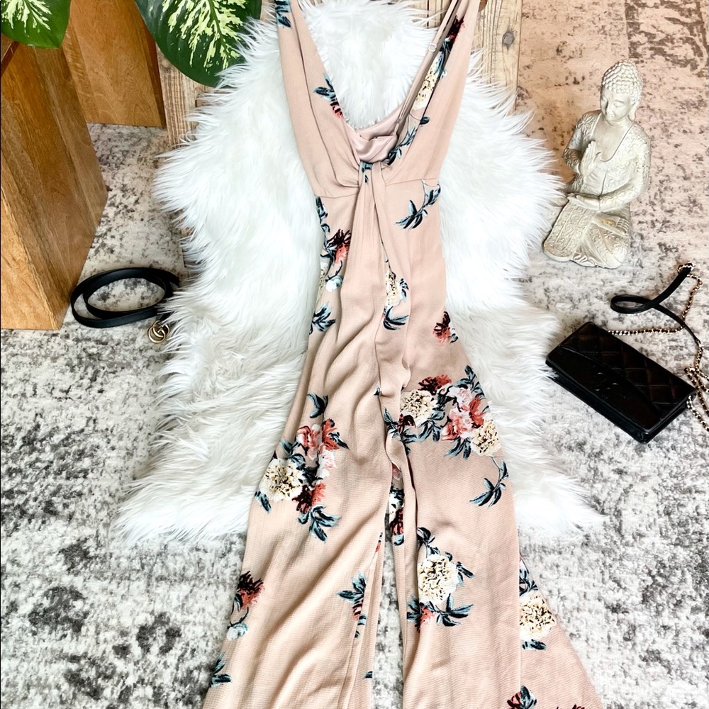 Floral Jumpsuit that gracefully hugs your curves.